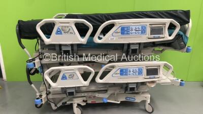 1 x Hill-Rom Total Care Electric Hospital Bed with Mattress and 1 x Hill-Rom TotaL Care Duo 2 Electric Hospital Bed with Mattress (Both Power Up and Tested Working) *S/N N000BV0004 / 12BB0002*