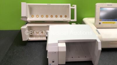 Mixed Lot Including 1 x Philips M2703A Fetal Monitor (Powers Up) 1 x Philips M2720A Fetal Transducer System with 1 x Philips US Transducer (Powers Up) 1 x Otoport OAE System NHSP Infant Hearing Unit (Untested Due to Possible Flat Batteries)1 x GE Caresca - 2