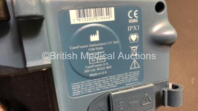 6 x Carefusion Alaris GH Plus Syringe Pumps (5 x Power Up with Gas Gauge GG1 Comms Failure, 1 x Draws Power, Unable to Tell if Powers Up Due to Damaged Screen - See Photo) - 4