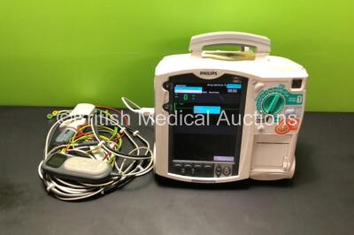 Philips HeartStart MRx Defibrillator with Pacer, CO2, ECG and Printer Options with 1 x M3539A Module, 1 x M3538A Battery, 1 x ECG Lead, 1 x Paddle Lead with Test Load and 1 x QCPR Meter *Mfd 05/2009* (Powers Up) *US00534238* (S)