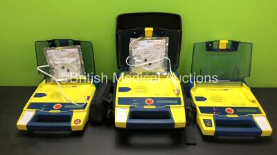 3 x Cardiac Science PowerHeart AED G3 Including 3 x Batteries and 1 x Carry Case (All Power Up)