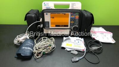 Medtronic Physio Control Lifepak 12 Defibrillator with ECG, Spo2, NIBP and Printer Options, 1 x 4 Lead ECG Lead, 1 x SpO2 Lead with Sensor, 1 x BP Hose with Cuff, 1 x Paddle Lead and Electrode Packs - Out of Date and 2 x Batteries (Powers Up with Service