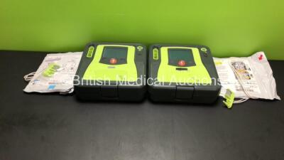 2 x Zoll AED Pro Defibrillators with 2 x Batteries, 2 x Electrode Packs *Both In Date* (Both Power Up - 2 Batteries Included) *AA07C005344 and AA13C027893*