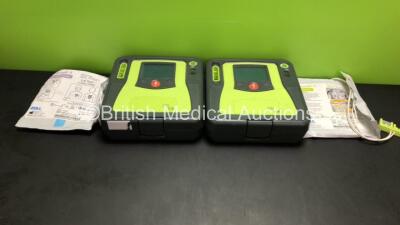 2 x Zoll AED Pro Defibrillators with 2 x Batteries, 2 x Electrode Packs *Both In Date* (Both Power Up - 2 Batteries Included) *AA11C020051 and AA06E002537*