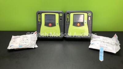 2 x Zoll AED Pro Defibrillators with 2 x Batteries, 2 x Electrode Packs *Both In Date* (Both Power Up - 2 Batteries Included) *AA07E005985 and AA06D002423*