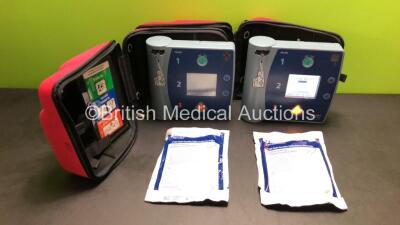 2 x Philips Heartstart FR2+ Defibrillators with 2 x Batteries *Install By - 03/2024 and 09/2026* (Both Power Up and Pass Self Test - 1 x Powers Up In French - 1 x Good Battery and 1 x Flat Battery Included) and 2 x Covidien Kendall 1710H Multi-Function De