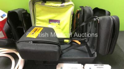 Mixed Lot Including 1 x BSU Suction Unit (Untested Due to Missing Power Supply) 3 x Pneupac VR1 Patient Valves with 3 x Hoses, 2 x Medtronic Lifepak Defibrillator Carry Cases, 1 x Maternity Carry Bag and 5 x Physio Control Lifepak NiCd Batteries *Untested - 5