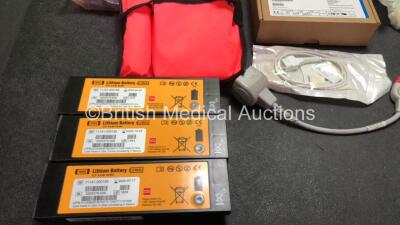 Mixed Lot Including 2 x AD Elektronic MBSS Mobile Battery Service Station Mounting Brackets with 5 x DC Power Supplies, 3 x Physio Control Ref 11141-000156 Batteries *All Untested* Face Masks, 1 x Emma Ref 606100 Capnometer in Case (Powers Up) 4 x Thermo - 2