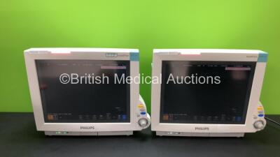 2 x Philips IntelliVue MP70 Patient Monitors *Mfd 2011-12* (Both Power Up) *SN DE843B4136 / DE843B4133*