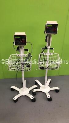 2 x CSI Criticare SPO2/Comfort Cuff Model 506DXN VItal Signs Monitors on Stands (Both Power Up)