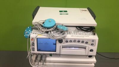 GE Corometrics 250cx Series Fetal Monitor with US, US2, UA, FECG/MECG and Printer Options, 3 x US Transducers and 1 x Patient Response Trigger on Trolley (Powers Up) *W* - 2