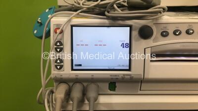 GE Corometrics 250cx Series Fetal Monitor with US, US2, UA, FECG/MECG and Printer Options, 3 x US Transducers and 1 x Patient Response Trigger on Trolley (Powers Up) *W* - 3