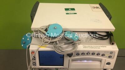 GE Corometrics 250cx Series Fetal Monitor with US, US2, UA, FECG/MECG and Printer Options, 3 x US Transducers and 1 x Patient Response Trigger on Trolley (Powers Up) *W* - 4