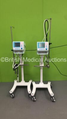 2 x Acutronic Medical Systems Fabian Therapy Ventilators *Mfd - 2012* Software Revision - 1.00 on Stands with Hoses (Both Power Up) *W*