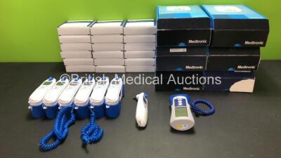 Job Lot Including 7 x Covidien Genius 3 Tympanic Thermometers with Bases (1 x No Base), 18 x Boxes of Genius 2 Tympanic Probe Covers, 6 x Medtronic MyCareLink Monitors and 1 x Covidien Filac ADA Thermometer