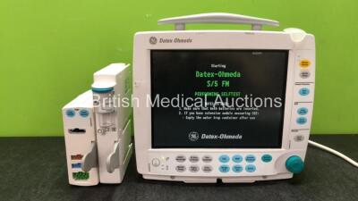 GE Datex Ohmeda S/5 FM Patient Monitor with 1 x GE Type E-PSM-00 Module Including ECG, SpO2, NIBP, T1, and T2 Options, 1 x GE Type N-FC-00 Gas Module with Mini D-Fend Water Trap (Powers Up with Damaged Casing-See Photo) *SN 6958824, 6204671, 6267768*