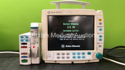 GE Datex Ohmeda S/5 FM Patient Monitor with 1 x GE Type E-PSMP-01 Module Including ECG, SpO2, NIBP, P1,P2, T1, and T2 Options, 1 x GE Type N-FC-00 Gas Module with Mini D-Fend Water Trap (Powers Up with Damaged Casing and Missing Light Cover-See Photos) *S