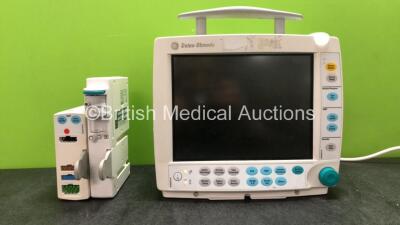 GE Datex Ohmeda S/5 FM Patient Monitor with 1 x GE Type E-PSM-00 Module Including ECG, SpO2, NIBP, T1, and T2 Options, 1 x GE Type N-FC-00 Gas Module with Mini D-Fend Water Trap (Holds Power with Blank Screen and with Damaged Casing-See Photos) *SN 617523