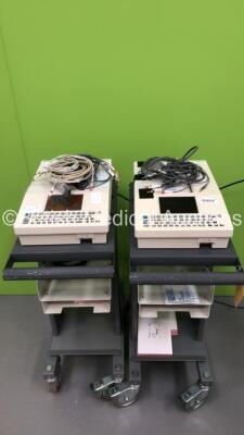 2 x Spacelabs Burdick Eclipse 850 ECG Machines on Stands with 2 x 10 Lead ECG Leads (Both Power Up - 2 x Damaged Screen) *S/N 106800000293 / 10680000225*