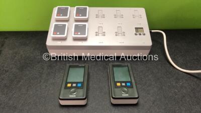 2 x Philips IntelliVue MX40 Patient Monitoring Systems Including ECG and SpO2 Options *Mfd 07/2012, 07/2014* with 1 x Philips Ref 865220 Battery Charger *Mfd 10/2016* 4 x Batteries (Powers Up)