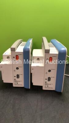 2 x Drager Infinity Delta Patient Monitors Including HemoMed 1, Aux/Hemo 3, MultiMed and NIBP Options with 2 x Drager Infinity Docking Stations and 2 x AC Power Supplies (Both Power Up) *SN 5469508255, 5206110E546, 5395575661, 6003184370, 152194, MS182840 - 5