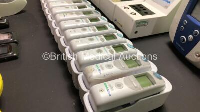 Mixed Lot Including 16 x Braun ThermoScan Pro 6000 Ear Thermometers with Bases, 1 x Footswitch, 1 x Welch Allyn Otoscope Attachment, 1 x Welch Allyn SPOT Vital Signs Monitor (Missing Casing, See Photos) 2 x Novacor R,Test Monitor and 3 x Thrombotrack Unit - 4