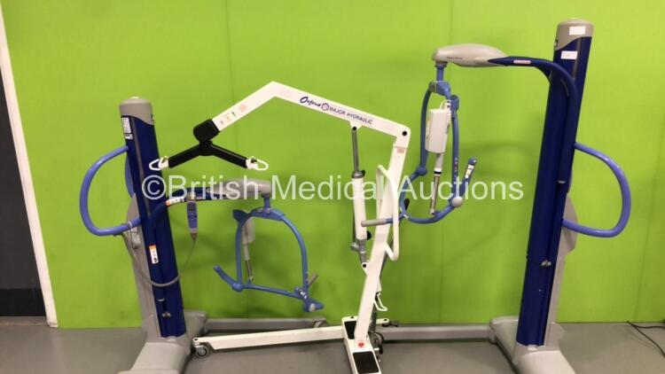 2 x Arjo Maxi-Move Electric Patient Hoist with 1 x Battery and 2 x Controllers (Both Power Up) and 1 x Oxford 175 Major Hydraulic Patient Hoist *S/N 75464 / 100054*