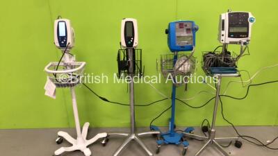 1 x Dinamap Compact TS Vital Signs Monitor on Stand (Powers Up),1 x GE Dinamap Pro 300 Vital Signs Monitor on Stand with BP Hose (Powers Up), 1 x Welch Allyn 420 Series Patient Monitor on Stand (No Power) and 1 x Welch Allyn SPOT Vital Signs Monitor on St