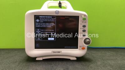 GE Dash 3000 Patient Monitor Including ECG, CO2, NBP, BP1, BP2, SpO2, Temp/CO Options with 2 x Batteries (Powers Up with Damaged Casing and Handle-See Photos)