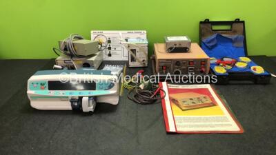 Mixed Lot Including 1 x Cardinal Health Alaris PK Pump (Powers Up) 1 x JMW Medical Simcal 5 Unit, 1 x Digitimer Stimulator Model DS7 Unit (No Power) 1 x Safety Plug Analyzers and 1 x Gaymar T PT-9 Unit