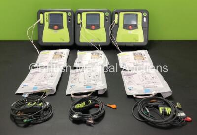 3 x Zoll AED Pro Defibrillators with 3 x Batteries, 3 x ECG Leads and 6 x Electrode Packs (All Power Up) *AA10C016710, AA11A019668 and AA10C016681*