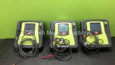 3 x Zoll AED Pro Defibrillators with 3 x Batteries and 3 x ECG Leads (All Power Up) *SN AA10C016821, AA09L015657, AA10C016835*