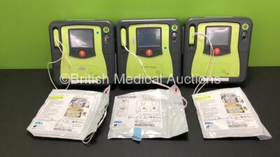 3 x Zoll AED Pro Defibrillators with 3 x Batteries and 3 x Electrode Packs (All Power Up) *AA07E006019, AA10C016630 and AA09C013170*