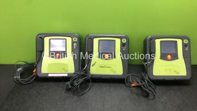 3 x Zoll AED Pro Defibrillators with 3 x Batteries and 3 x ECG Leads (All Power Up) *SN AA09F013941, AA07E005954, AA100B016547*