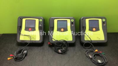 3 x Zoll AED Pro Defibrillators with 3 x Batteries and 3 x ECG Leads (All Power Up) *SN AA09L015733, AA10J019068, AA10C016722*