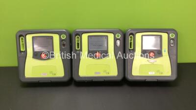 3 x Zoll AED Pro Defibrillators with 3 x Batteries (All Power Up, 1 x Slight Damage to Screen - See Photos) *AA11A019573, AA10C016811 and AA10C016675*