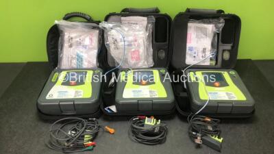 3 x Zoll AED Pro Defibrillators (2 x Screen Damage) in Cases with 6 x Electrode Packs and 3 x ECG Leads (All Power Up with Stock Batteries - Not Included)