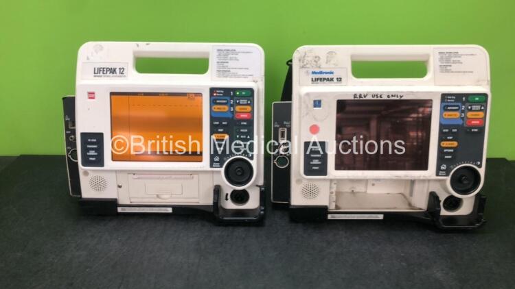 2 x Medtronic Lifepak 12 Biphasic Defibrillator / Monitors Including ECG, NIBP and SpO2 Options *Mfd 2007 - 2002* (Both Power Up with Stock Battery, Battery Not Included and 2 x Service Lights)