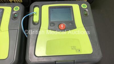 3 x Zoll AED Pro Defibrillators with 3 x Batteries, 3 x ECG Leads and 6 x Electrode Packs in Carry Cases (All Power Up, 3 x Slight Damage to Screens and 2 x Damage to Casing - See Photos) - 4