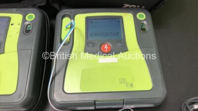 3 x Zoll AED Pro Defibrillators with 3 x Batteries, 3 x ECG Leads and 6 x Electrode Packs in Carry Cases (All Power Up, 2 x Slight Damage to Screens and 1 x Damage to Casing - See Photos) - 4