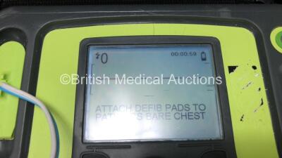 3 x Zoll AED Pro Defibrillators with 3 x Batteries, 3 x ECG Leads and 6 x Electrode Packs in Carry Cases (All Power Up, 2 x Slight Damage to Screens and 1 x Damage to Casing - See Photos) - 5