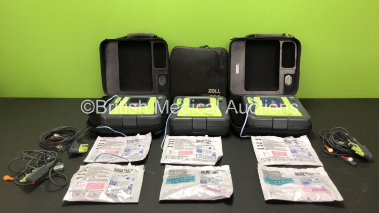 3 x Zoll AED Pro Defibrillators with 2 x Batteries, 3 x ECG Leads and 6 x Electrode Packs in Carry Cases (All Power Up, 2 x Slight Damage to Screens and 2 x Damage to Casing - See Photos)