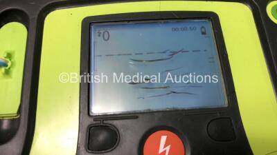 3 x Zoll AED Pro Defibrillators with 2 x Batteries, 3 x ECG Leads, 9 x Electrode Packs and 1 x Carry Case (All Power Up, 2 x Damage to Screens and 1 x Slight Damage to Casing - See Photos) - 4