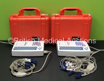 2 x Schiller Cardiovit AT-101 ECG Machines with Leads (Both Power Up, 1 x Slight Damage to Screen - See Photo)