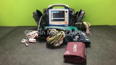 Zoll X Series Monitor/Defibrillator Including ECG, SpO2, NIBP, C02 and Printer Options with 1 x 4 Lead ECG Lead, 1 x 6 Lead ECG Lead, 1 x NIBP Hose, 2 x BP Cuffs, 1 x Paddle Lead, 1 x SpO2 Finger Sensor and 1 x Zoll Sure Power II Battery In Carry Case (Po