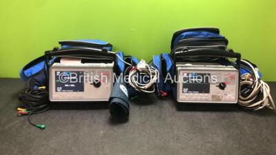 2 x Zoll E Series Defibrillator Including Bluetooth, ECG, SPO2, NIBP, C02 and Printer Options, 2 x 4 Lead ECG Leads, 2 x NIBP Cuff and Hose, 2 x SPO2 Finger Sensor, 2 x Paddle Leads, 2 x Mounting Brackets and 2 x Batteries in Carry Bags (Both Power Up)