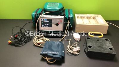 Zoll E Series Defibrillator with Bluetooth, Printer, ECG, SPO2, NIBP and C02 Options, 4 and 6 Lead ECG Leads, NIBP Cuff and Hose, Zoll LoFlo, SPO2 Finger Sensor, Paddle Lead, Zoll 4x4 Autoset Base Power Charger, 2 x Batteries and Mounting Bracket (Both Po