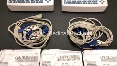 2 x Schiller AT-101 EKG Machines with Leads and 3 x ECG Electrodes Packs (All Expired 2022) in 2 x Carry Bags (1 x No Power, 1 x Missing Earthing Connection - See Photos) - 4