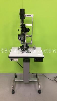 Haag Streit Bern SL900 Slit Lamp with Binoculars, 2 x 10x Eyepieces and Tonometer on Hydraulic Table (Draws Power - Blown Bulb - Damage to Wheel on Base of Lamp - See Pictures) *S/N 90026439*