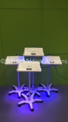 4 x Natus Neoblue LED Phototherapy Lights on Stands (All Power Up) *S/N 18192 / 24026 / 19184 / 24031*